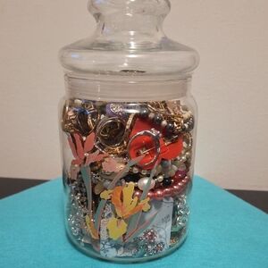 Decorative Glass Jar Filled with Colorful Jewelry